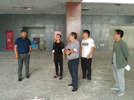 说明: E:\新馆\2016.04王涛\新建办：文秘资料\新闻\180910新闻稿：教师节卢云辉馆长一行考察大学城思雅图书馆建设\图1.jpg