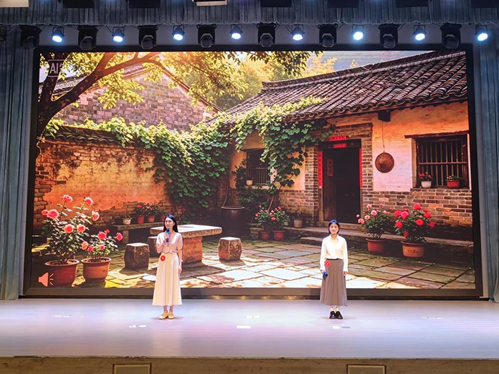 图2 林联焕、李怡（组合）诵读作品《铭记心头的往事》（节选）荣获其他读者组三等奖